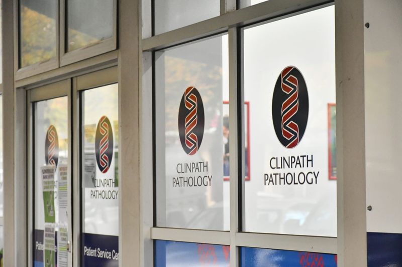 Pathology staff take action over under-payment post image