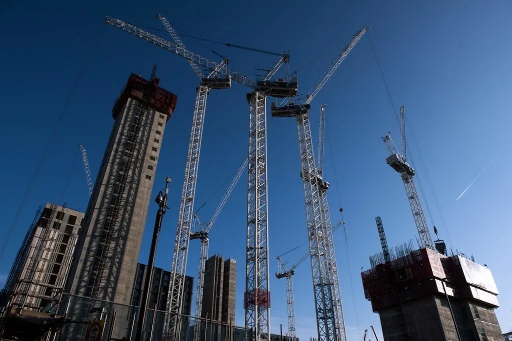 ‘The crane is God’: Meet the men who work 100ft in the sky