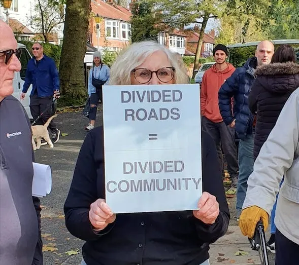 'I was literally manhandled': Another community divided over traffic and planters