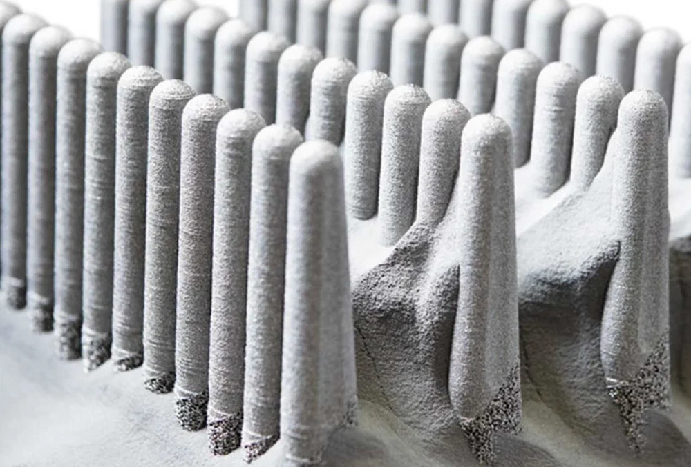 EBM 3D printed parts right after 3D printing and before excess powder is extracted