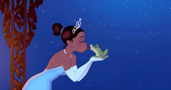 Disney's first Black Princess, Tiana, kisses a frog in "The Princess and the Frog"