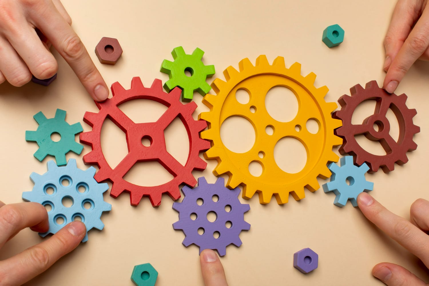 Colorful cogwheels are assembled together.