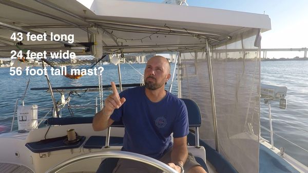 Me listing out the statistic of the boat. It is 43 feet long, 24 feet wide, 56 feet tall