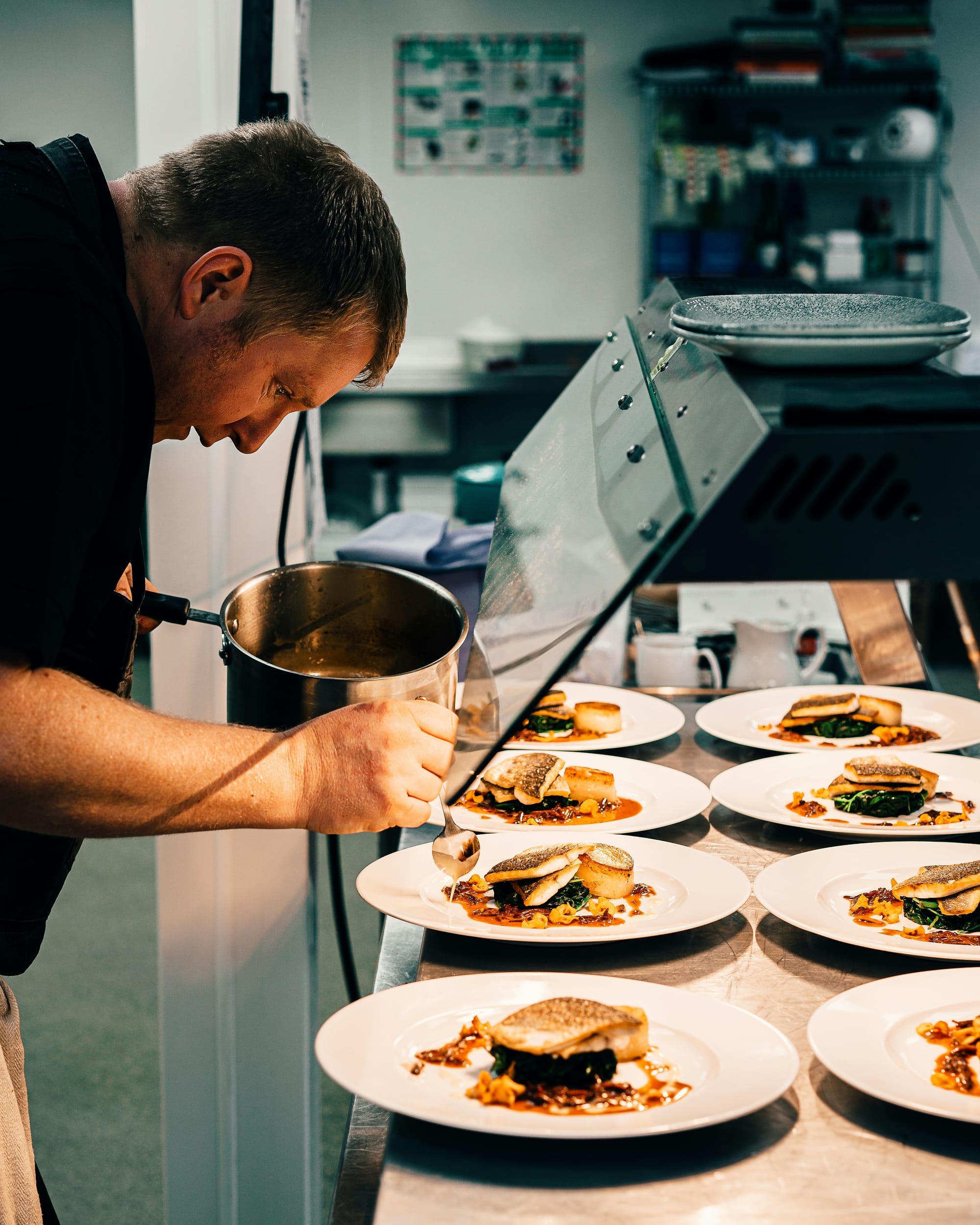Personal chef preparing a meal in a client’s kitchen