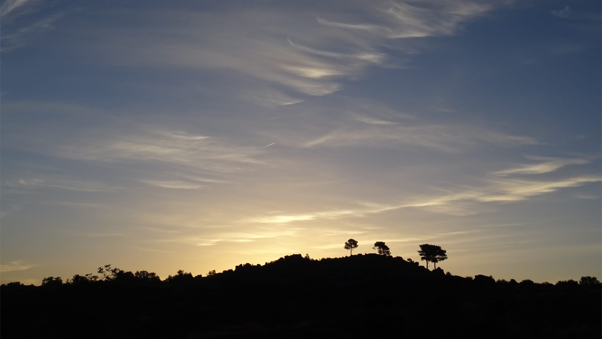 Sunrise over a Portuguese hill