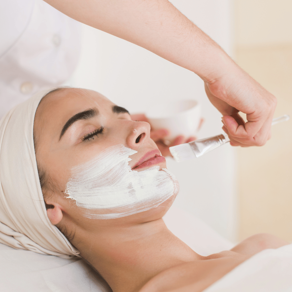 person undergoing a chemical peel in professional setting