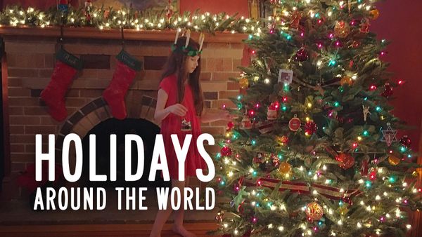 Wanda, wearing a Santa Lucia crown, with our Christmas tree.