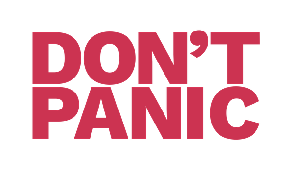 Don't Panic is written in all caps, in big, red block letters.