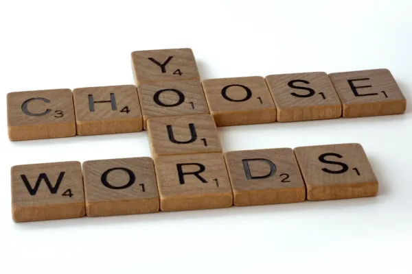 Words that Work: Persuasive Language for Security and Privacy Communications