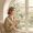 Woman sitting calm by the window