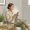 Woman sitting calmly in doctor's waiting room