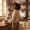 Woman standing back from steam rising in a kitchen.