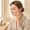  Woman gently applying serum to sensitive skin