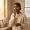  Woman moisturising her skin during a winter skincare routine