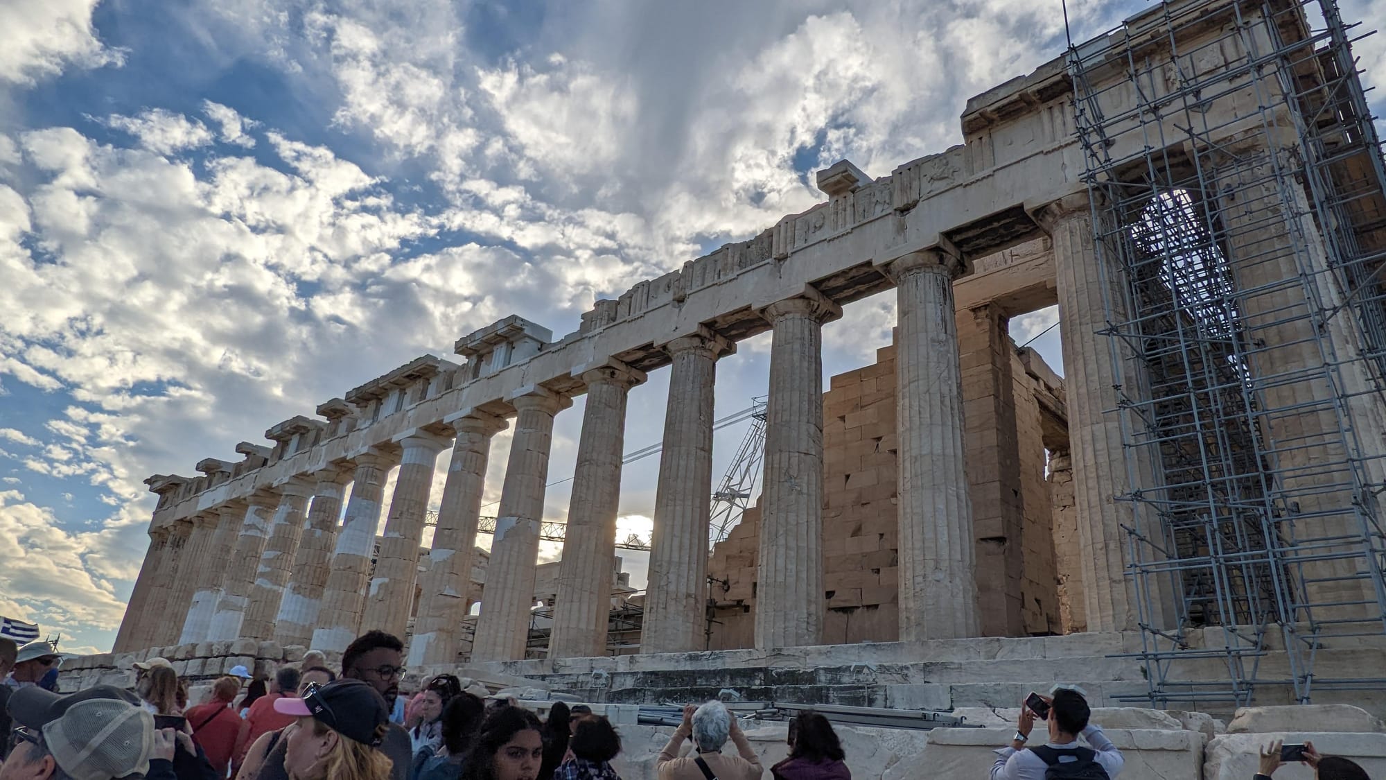 standing before the Acropolis