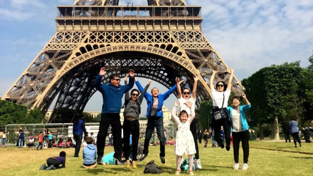 Chinese tourists at the Eiffel Tower in Paris during Golden Week