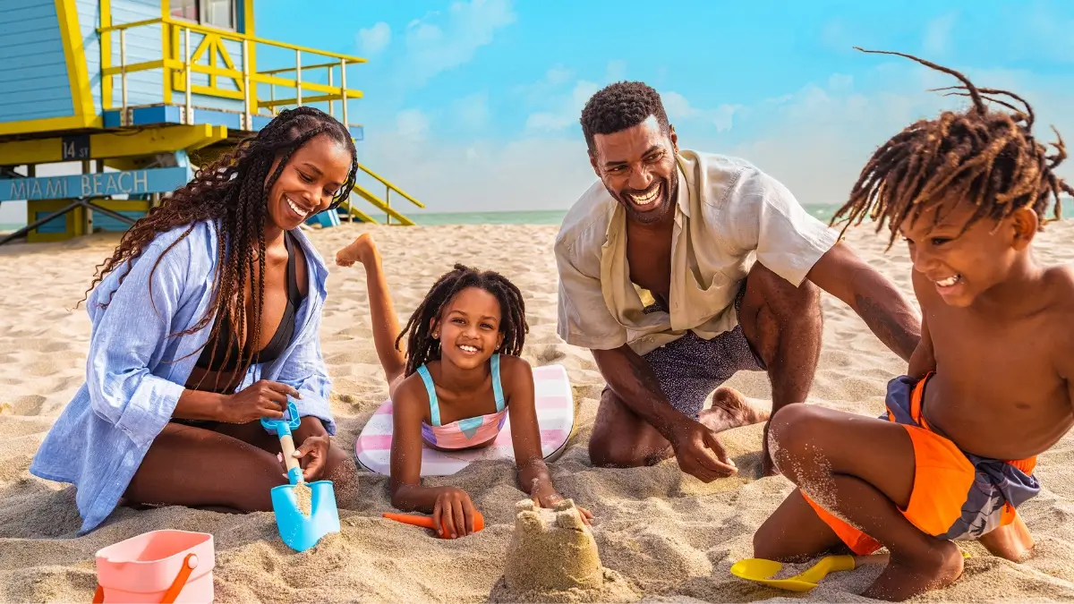 Family playing at Crandon Park Beach in Miami