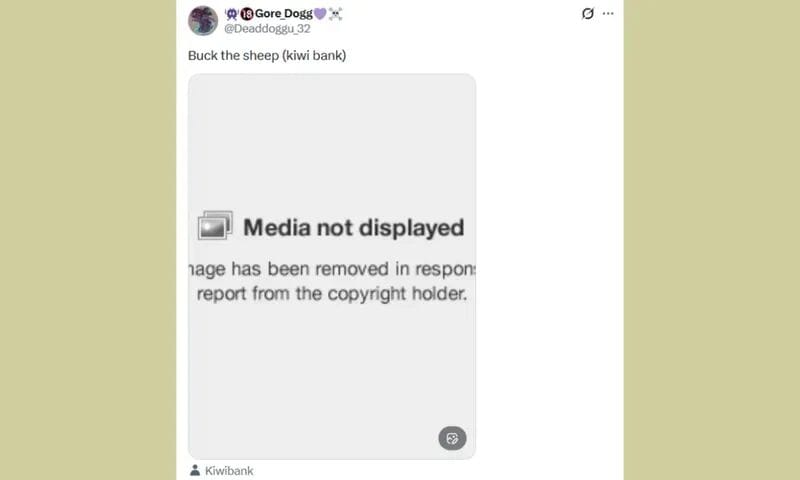 A Twitter post with a removed image displays a “Media not displayed” message due to copyright. The tweet’s text reads, “Buck the sheep (kiwi bank).” There is a visible link labeled “Kiwibank” below.