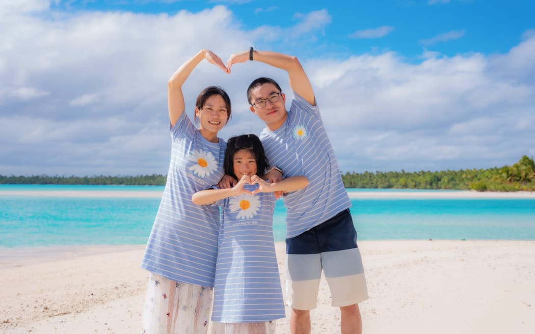 Luna Lu and her parents.