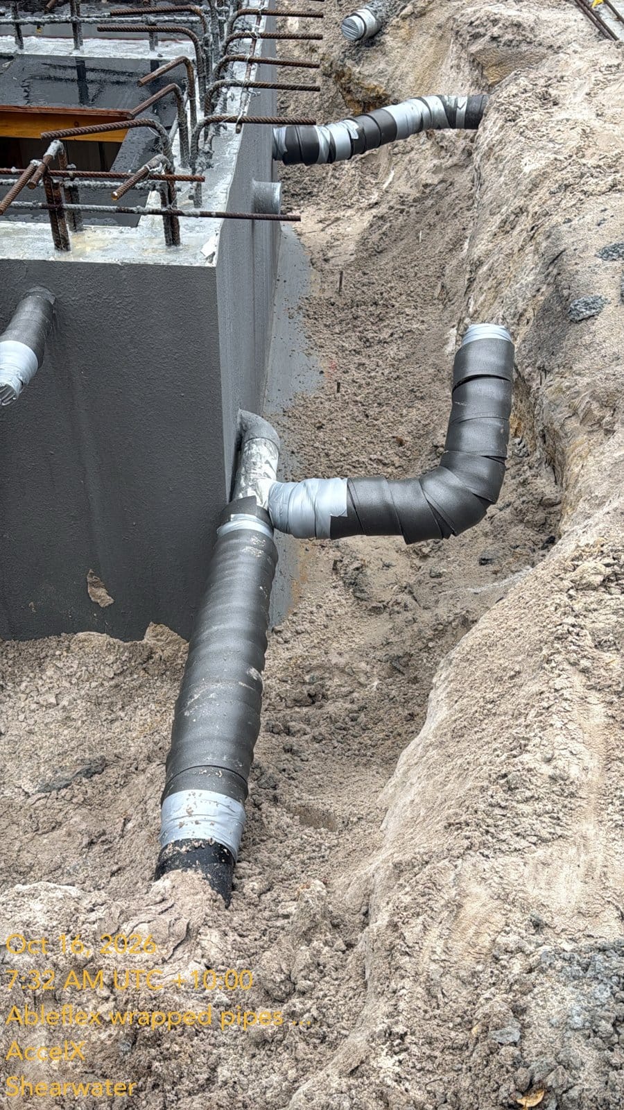 Pipes leaving the tank, double wrapped in Abelflex