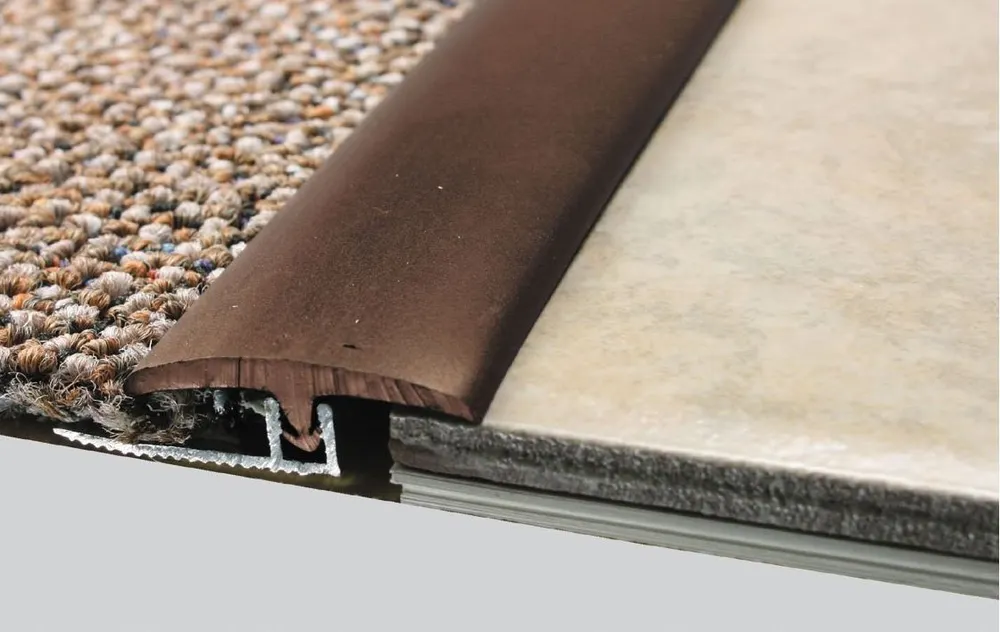 Timber transition between tiles and carpet 