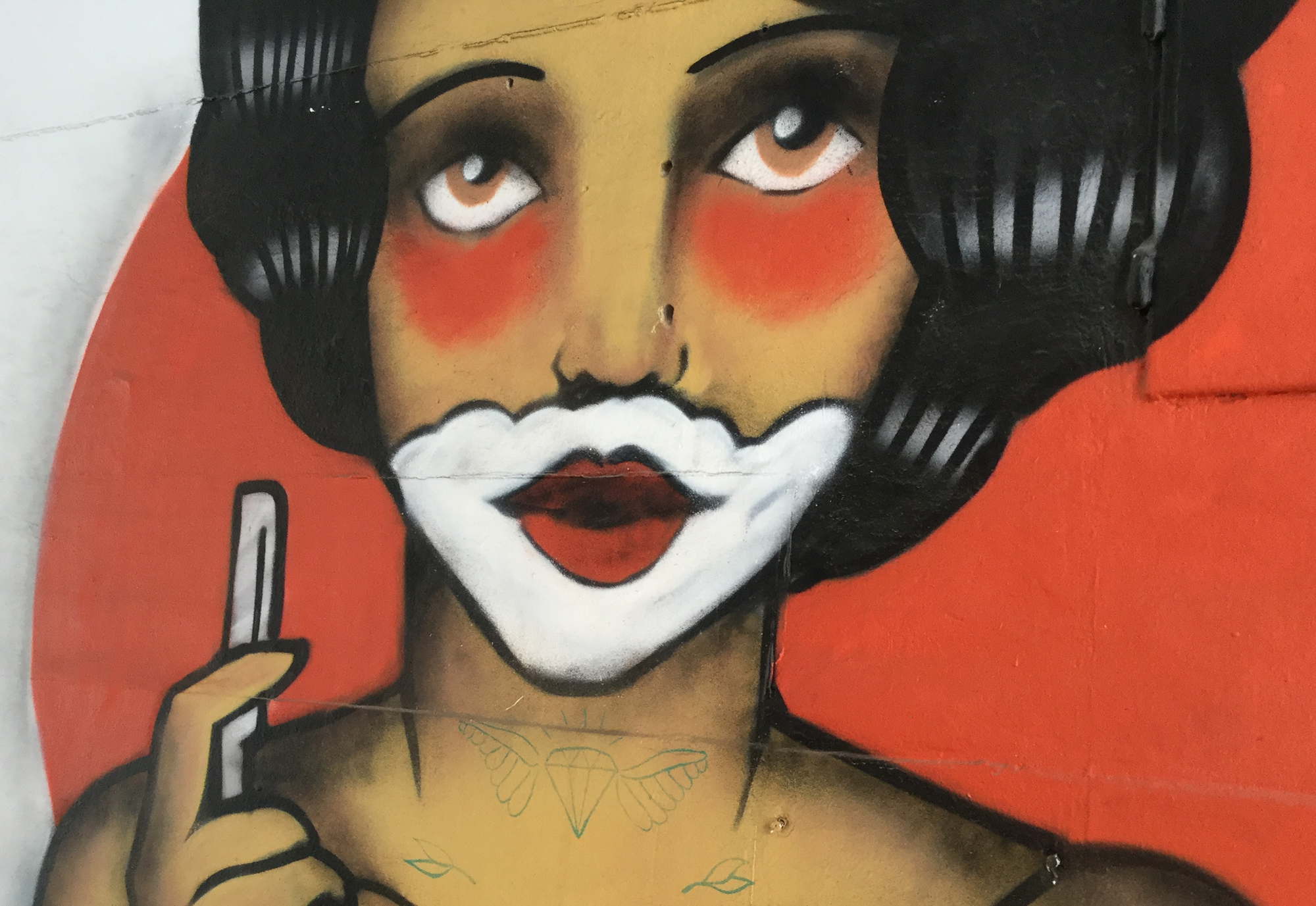 graffiti - zagreb, hrvatska - a female with a razor and foam on the chin