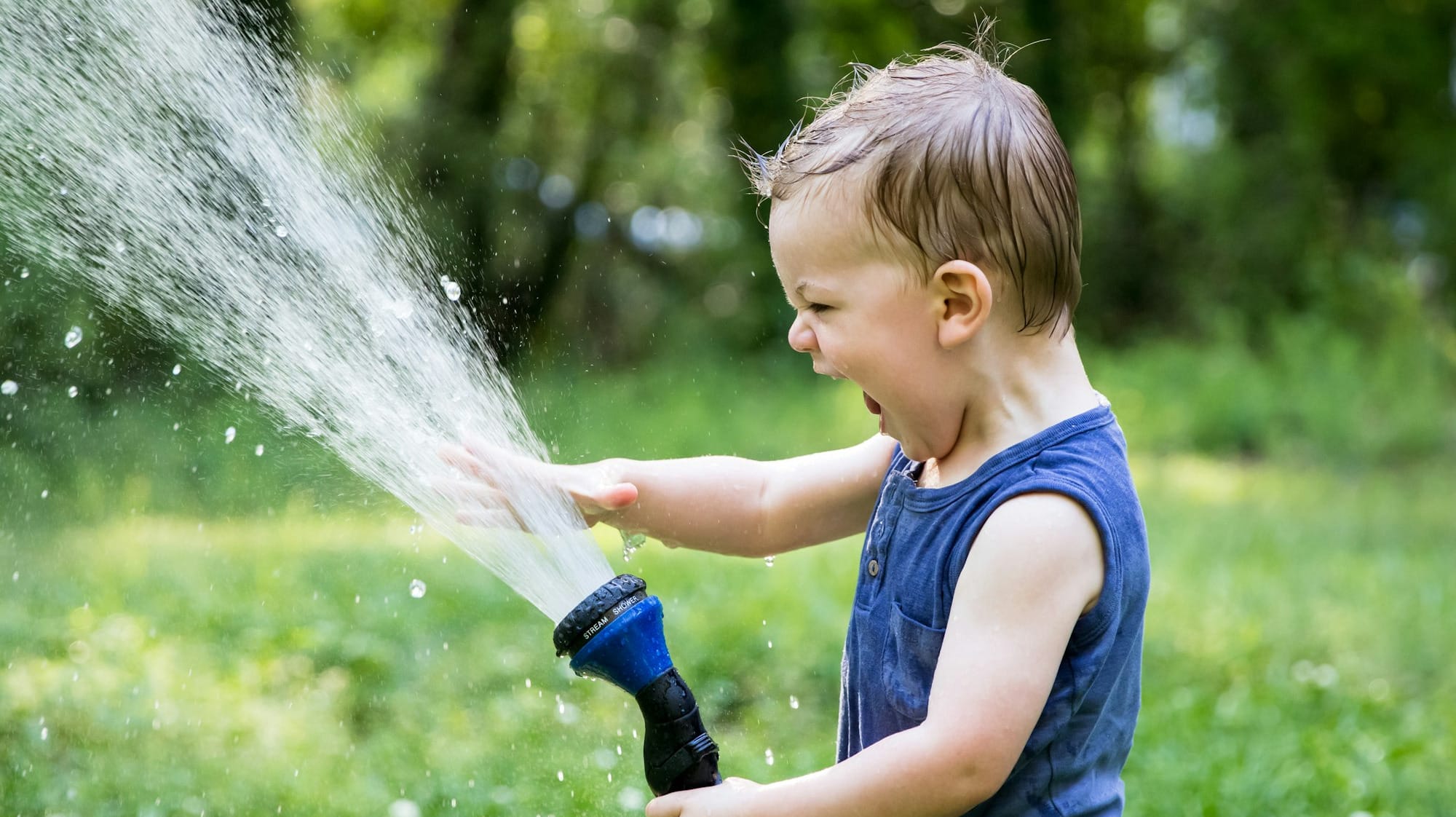 toddler playing water