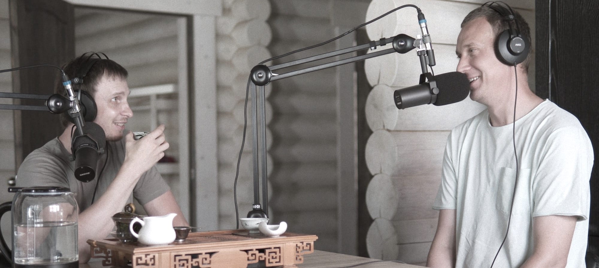 black and silver microphone on brown wooden table