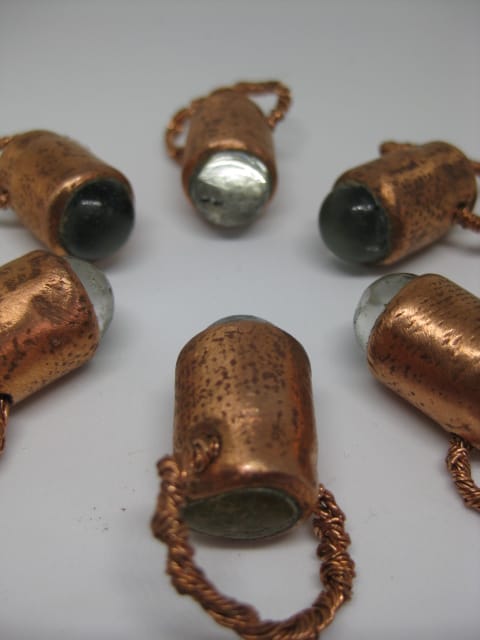 A close up for cat’s eye travel talismans by Die Booth