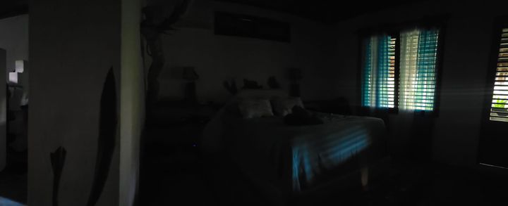 A darkened room. 