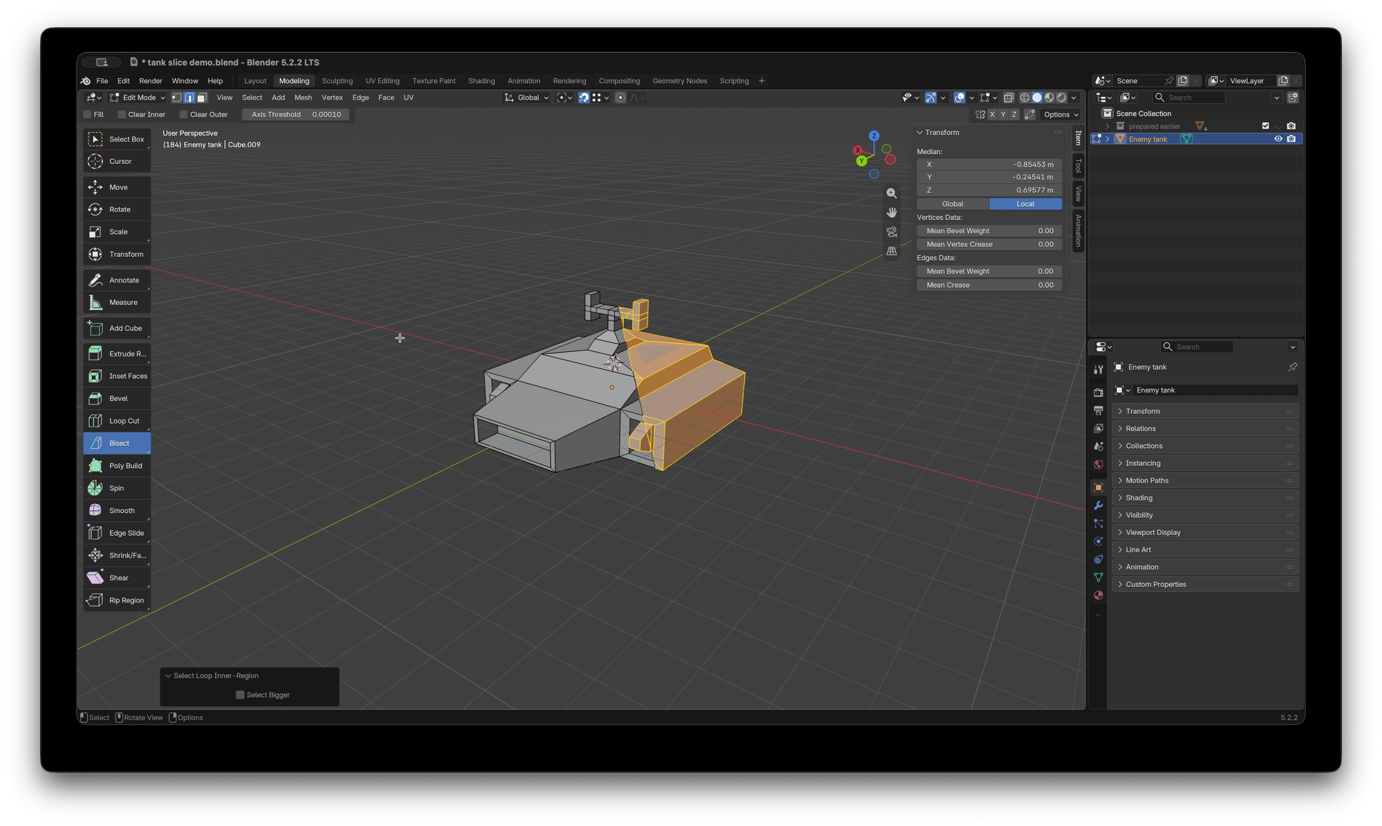 Blender UI with a simple model of a hover tank, cut in half with one half coloured yellow with its vertices selected.
