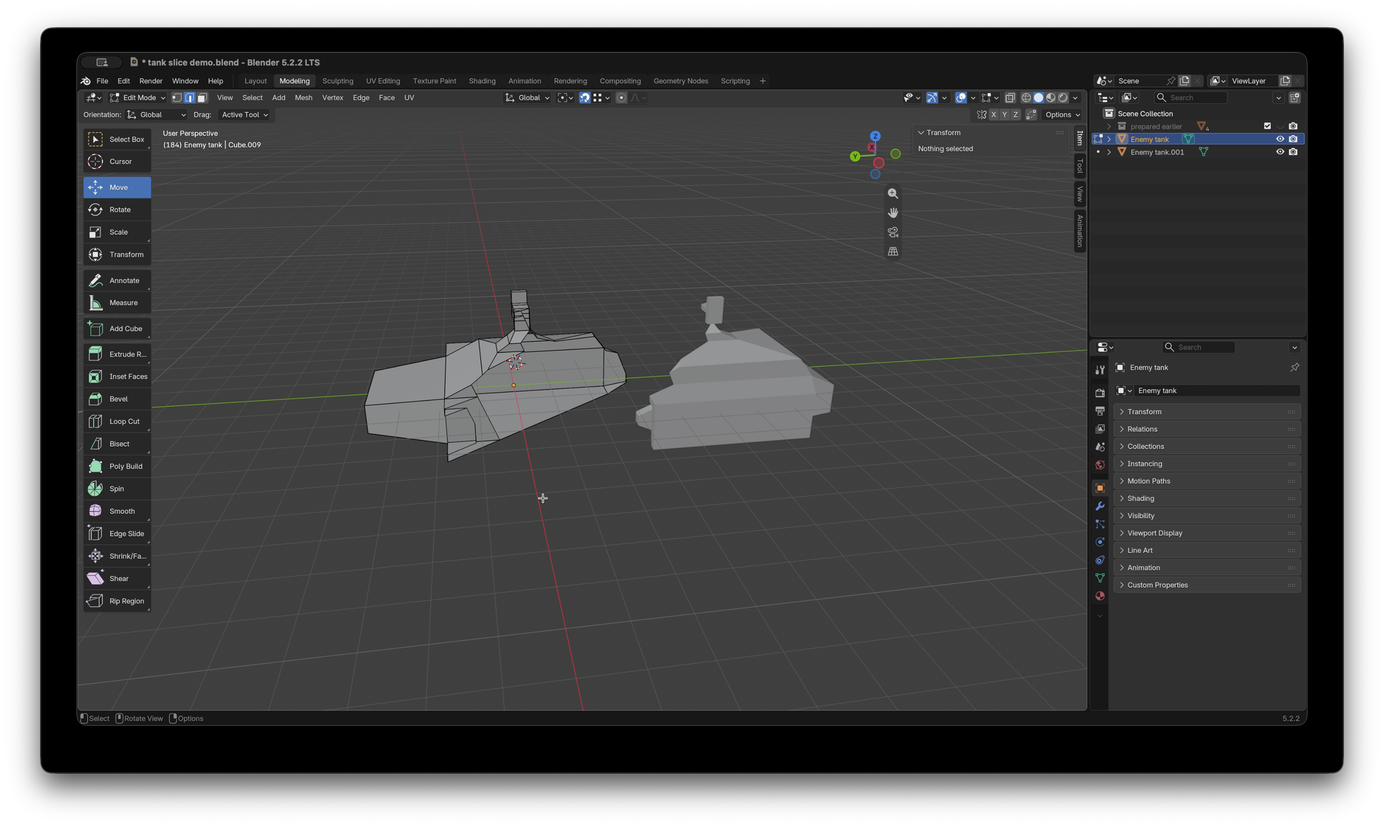 Blender UI with a simple model of a hover tank split in to two objects, in edit mode.