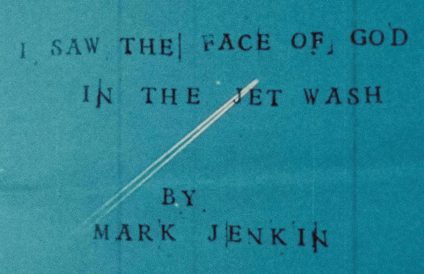 Title card reading "I SAW THE FACE OF GOD IN THE JET WASH BY MARK JENKIN" on teal background with a jet contrail.