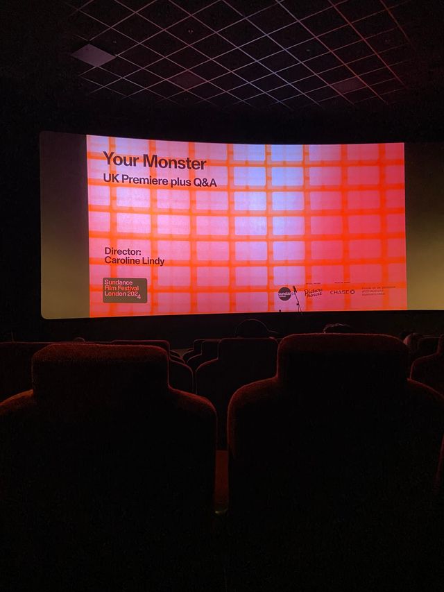 Cinema screen showing "Your Monster" UK Premiere plus Q&A, directed by Caroline Lindy, at Sundance Film Festival London 2024.