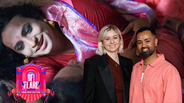 Two people smiling at BFI Flare London LGBTQIA+ Film Festival, with a colorful backdrop showing a person in a red sari.