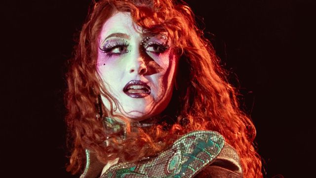 American musician Chappell Roan performing in Paris, France on 20 August 2025 - A Redhead white woman in rococo drag makeup, onstage performing.