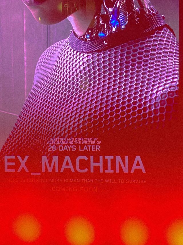 Movie poster for Ex Machina showing a humanoid robot torso in metallic mesh, bathed in red and purple lighting.
