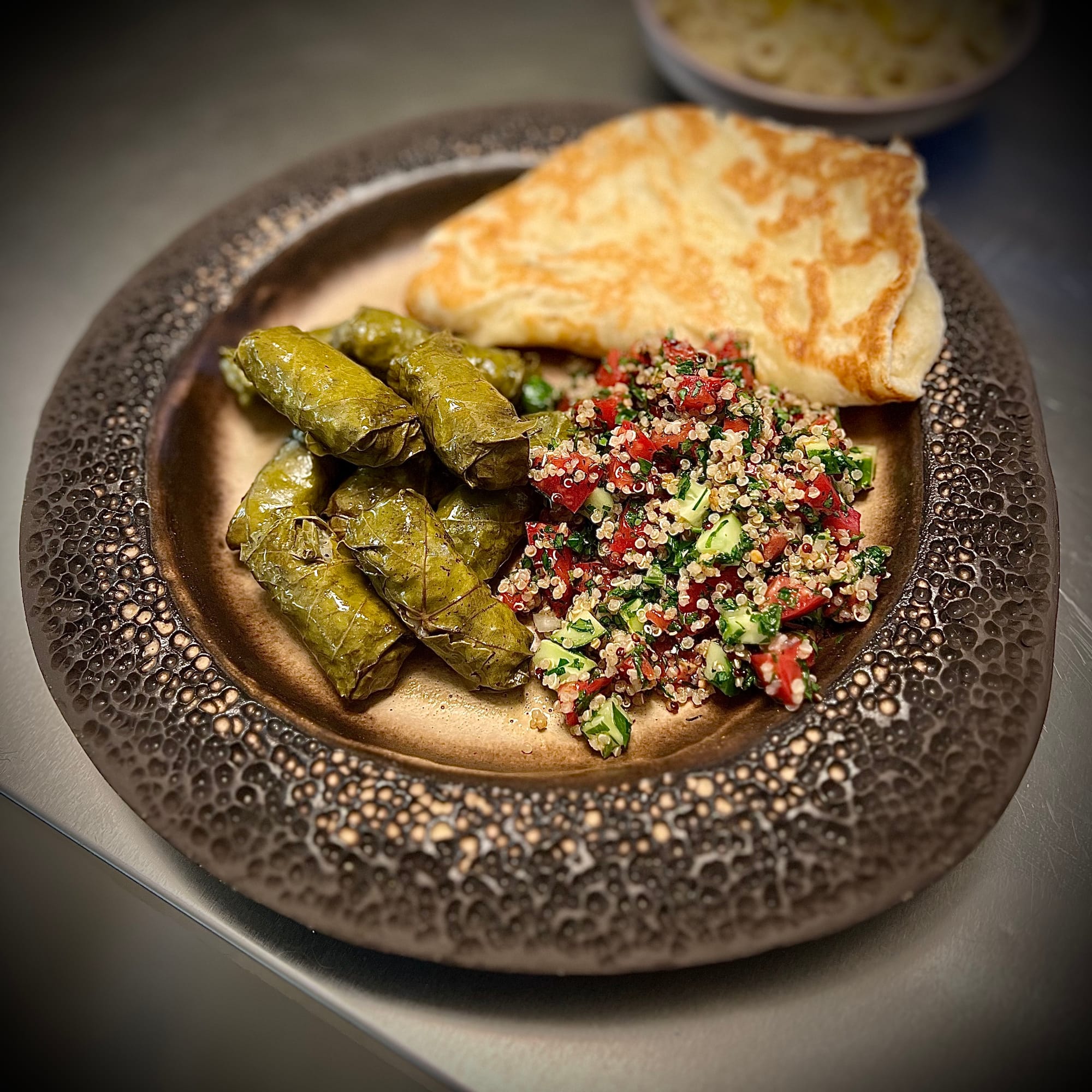 Homemade Stuffed Grape Leaves, Tabouleh, and Flatbread