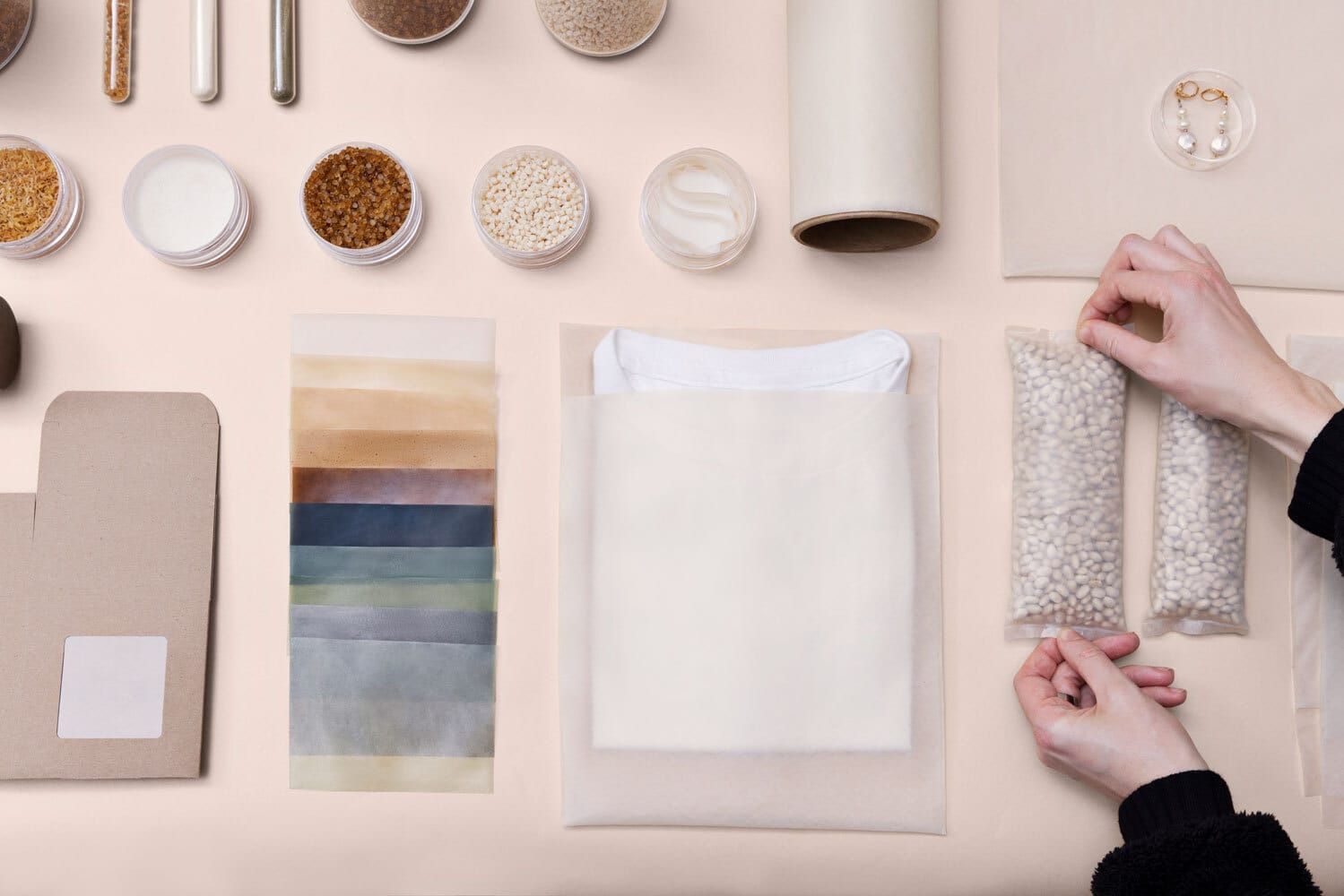 A variety of plastic products with two hands holding a bag