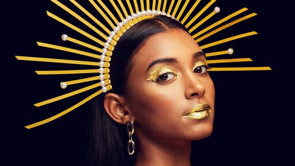 Indian Woman with gold eyeshadow, gold lipstick, and golden crown | Mindfulness for Self-Love
