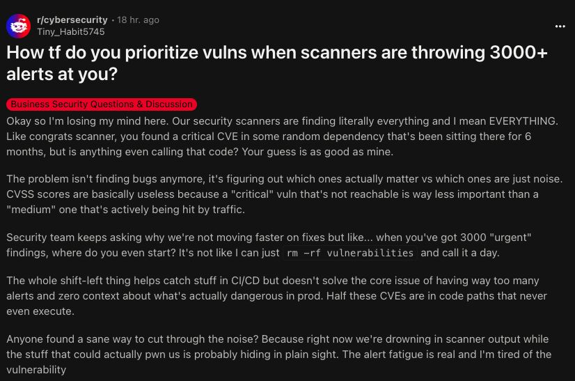 Screenshot of a Reddit post from a security professional asking how to prioritize vulnerabilities when scanners throw over 3,000 alerts, highlighting struggles with alert fatigue and noise in vulnerability management.