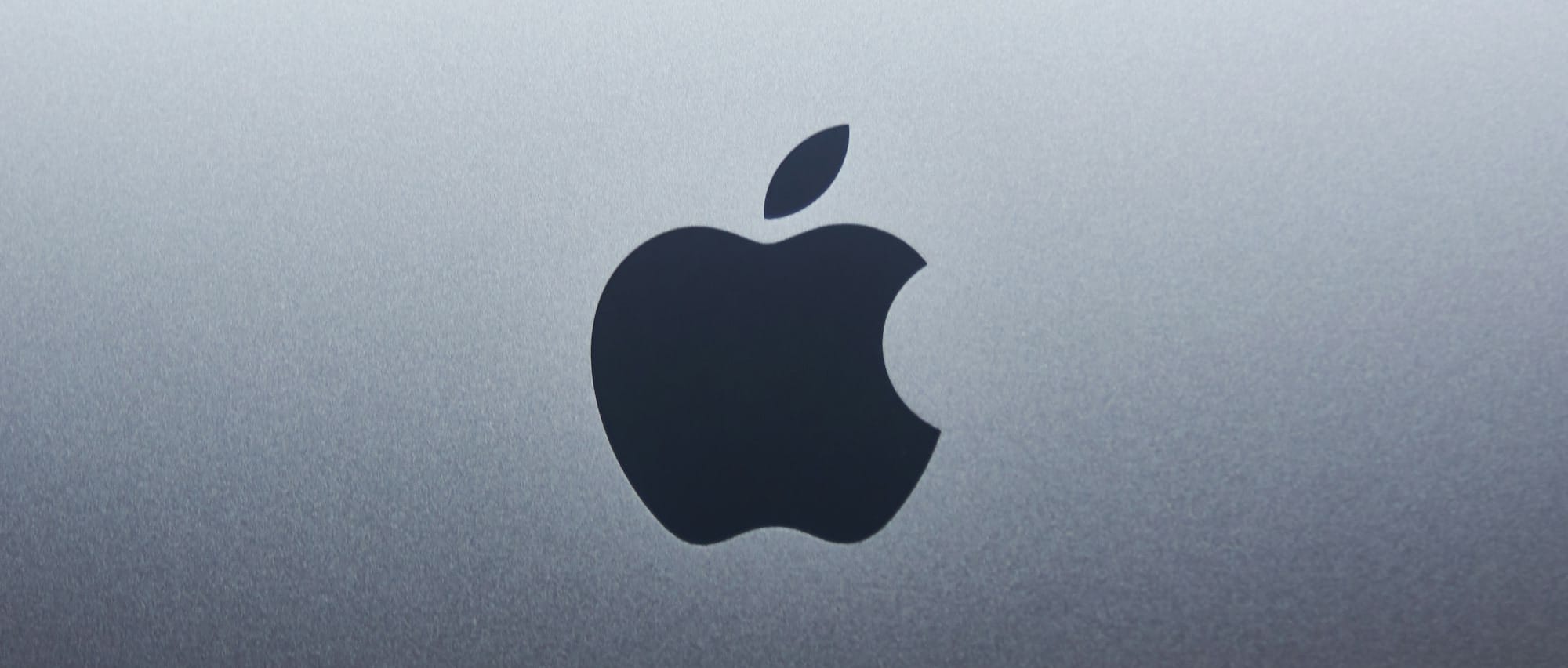 apple logo on blue surface