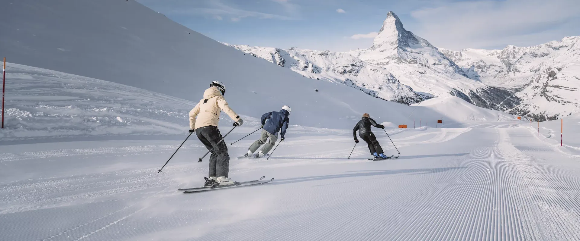 3 people skiing a groomed run at Matterhorn Ski Paradise