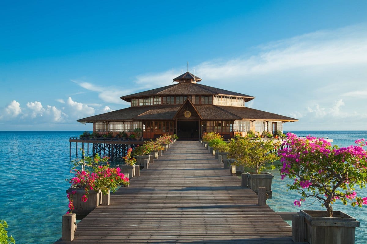 A wooden pier leading to a building in Sandakan, Borneo.
