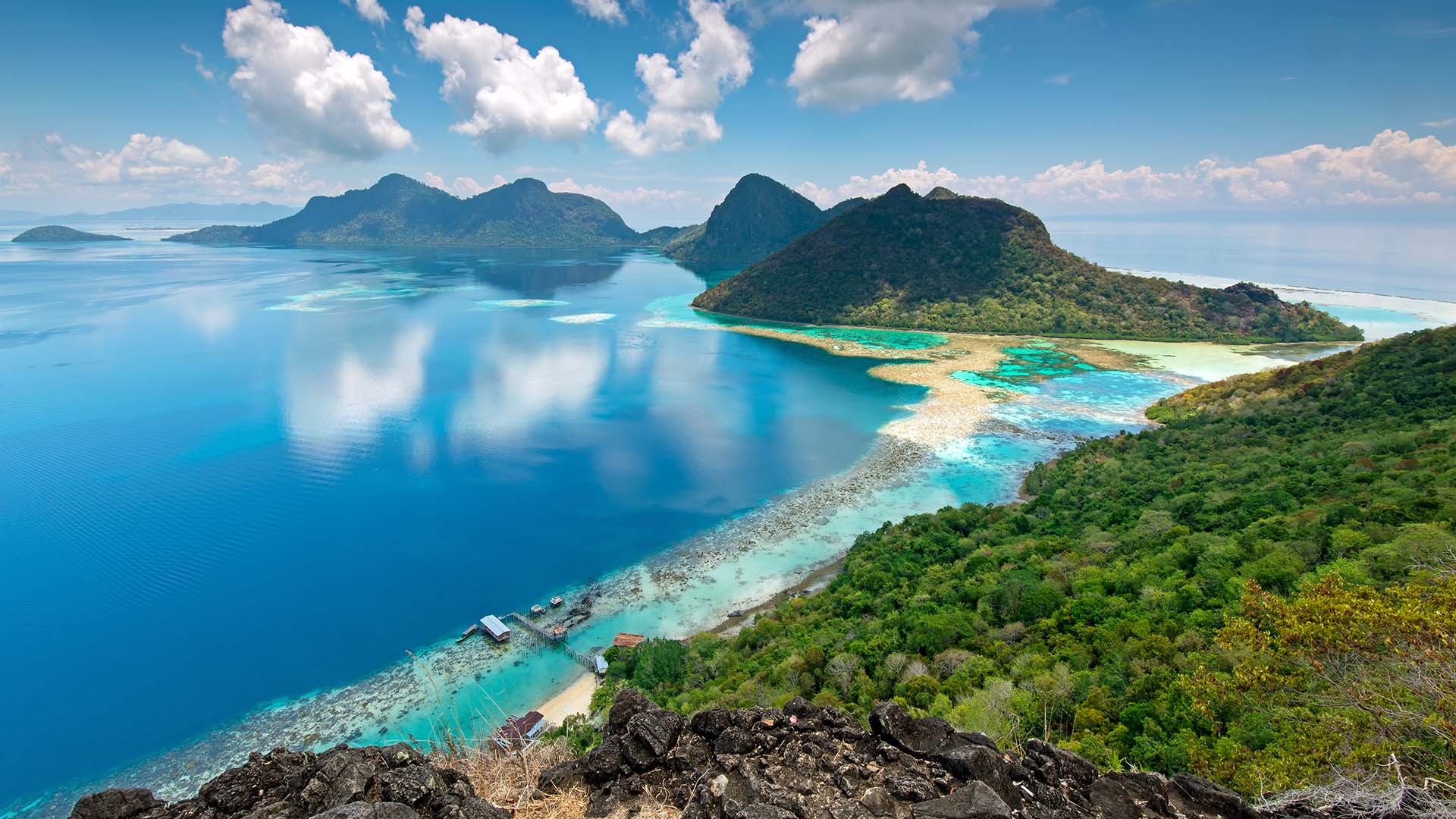Ariel view of the ocean and mountains at Kota Kinabalu in Borneo.