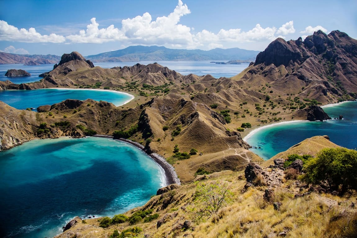 Ariel view of the topical beaches and mountains at Komodo National Park.