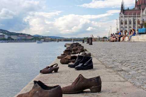 Rusty iron shoes placed on the water front in Budapest's Danube Promenade. 