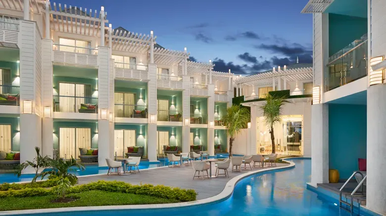 An ultra modern looking that's interior court yard has a swimming pool that is accessible directly from the guest room patios at Azul Beach Resort Negril..