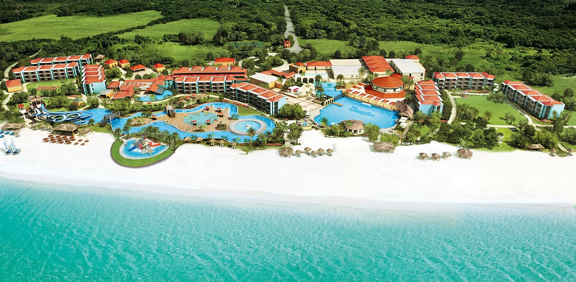 Ariel view of a beautiful beach with crystal clear Caribbean waters at Beaches Negril Resort & Spa.