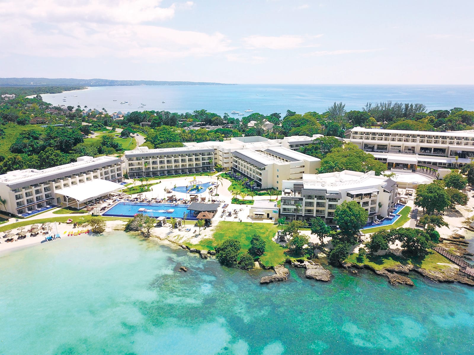 Ariel view of Royalton Negril Resort & Spa next to the ocean.
